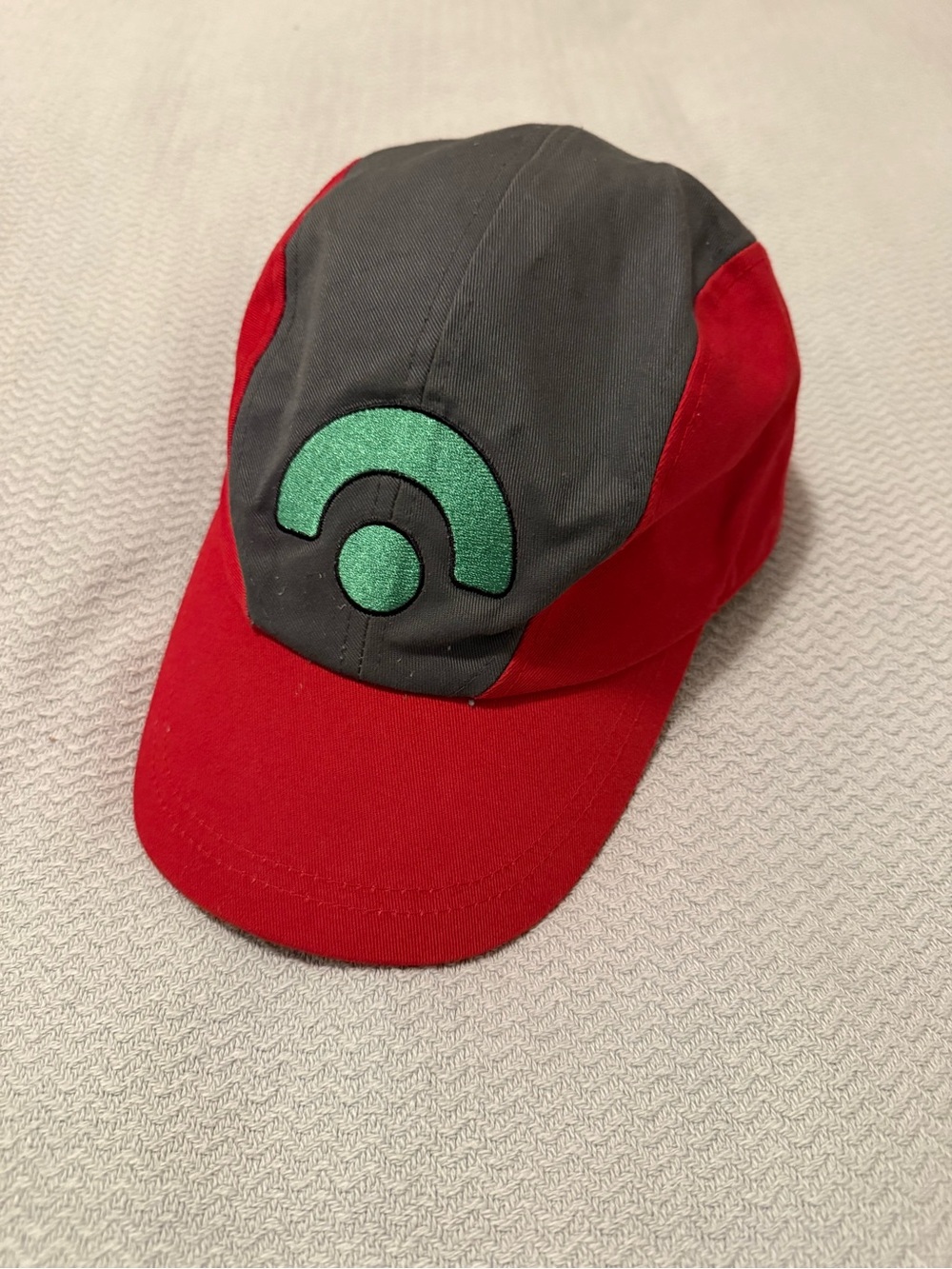 Vintage 2005 Nintendo Red and Gray Cap with Green Patch Emblem Ash Ketchum